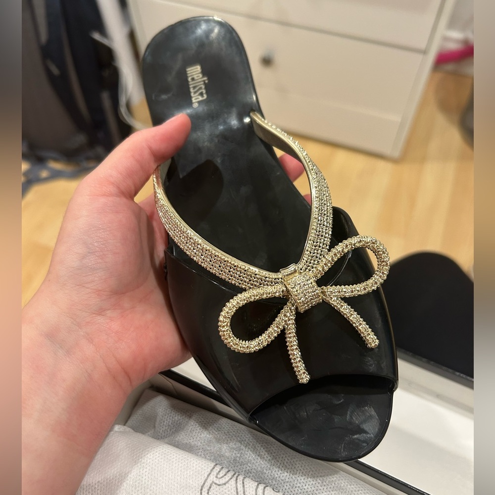 Melissa black and gold bow flats